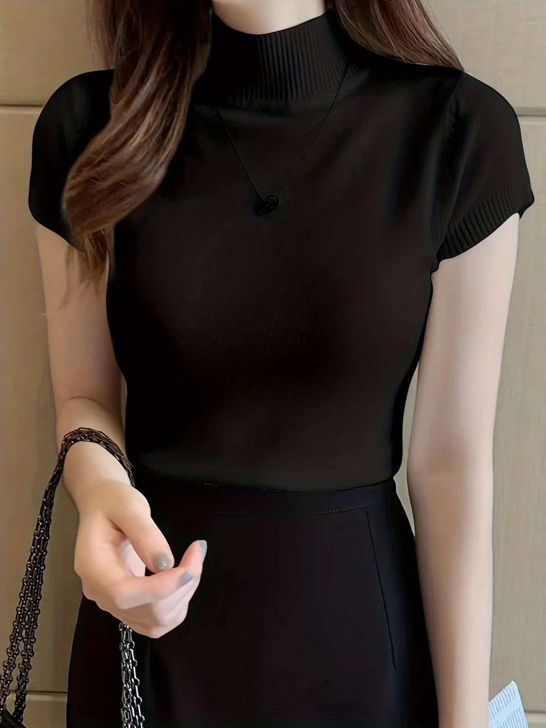 Detalle tejido elástico blusa médica