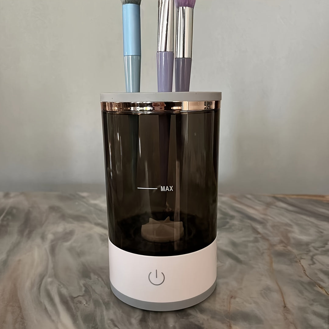 Claro. Aquí tienes el texto alternativo optimizado:  **Brocha de maquillaje girando en el bol del limpiador eléctrico USB pre