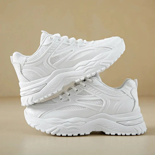 Material liso blanco fácil limpieza.